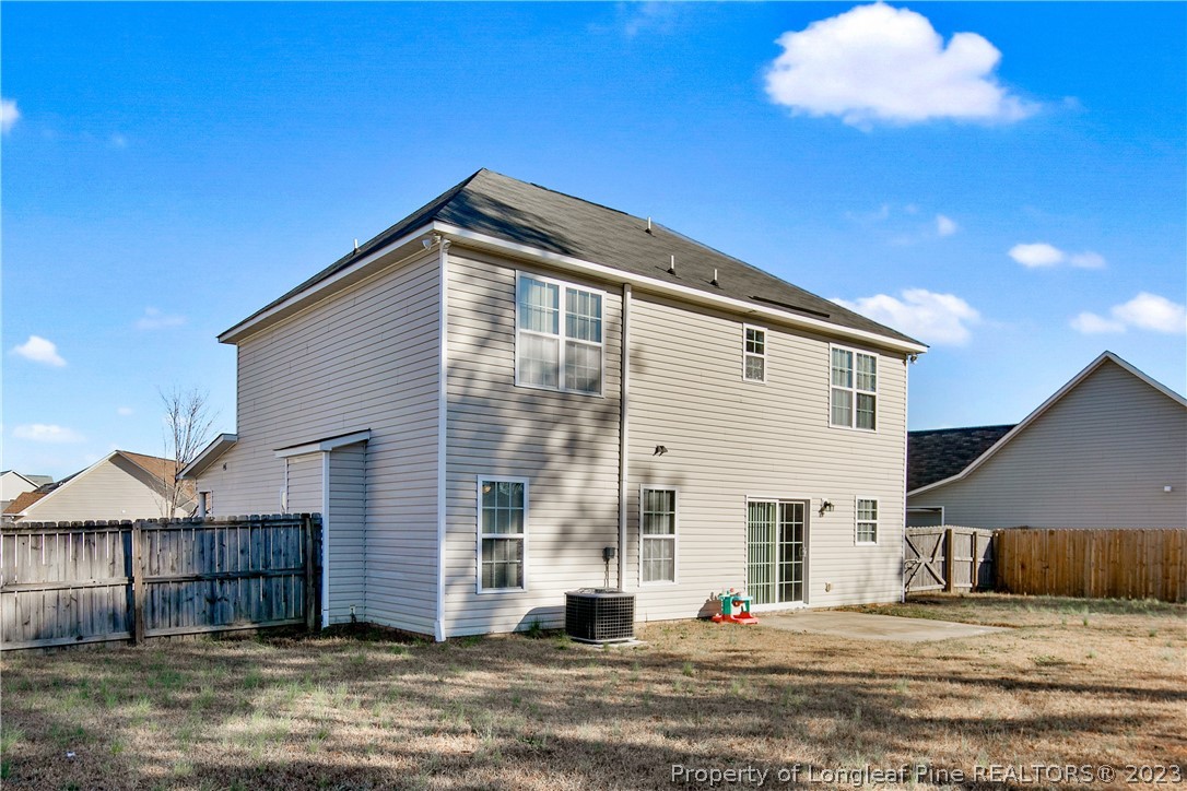 2040 Yellowbrick Road Fayetteville, NC 28314 - Photo 49 of 50 a view of a house with a patio