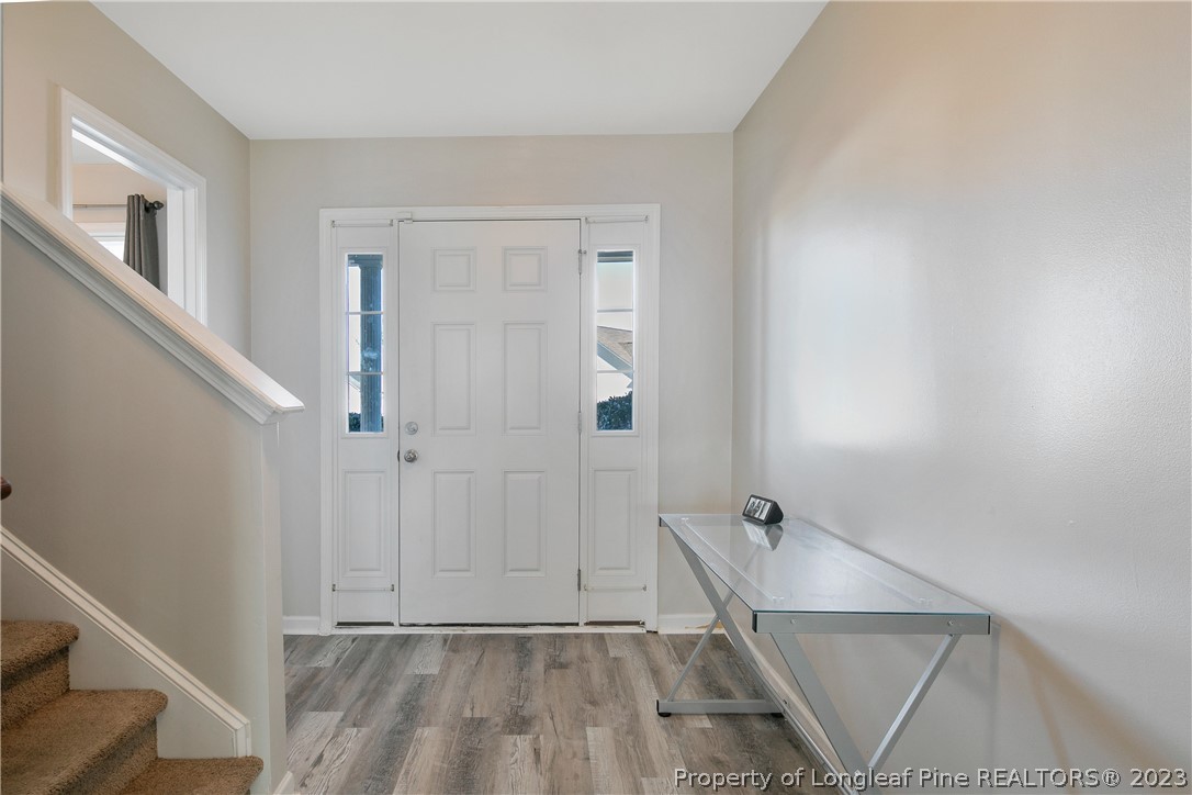 2040 Yellowbrick Road Fayetteville, NC 28314 - Photo 6 of 50 a view of an entryway with staircase