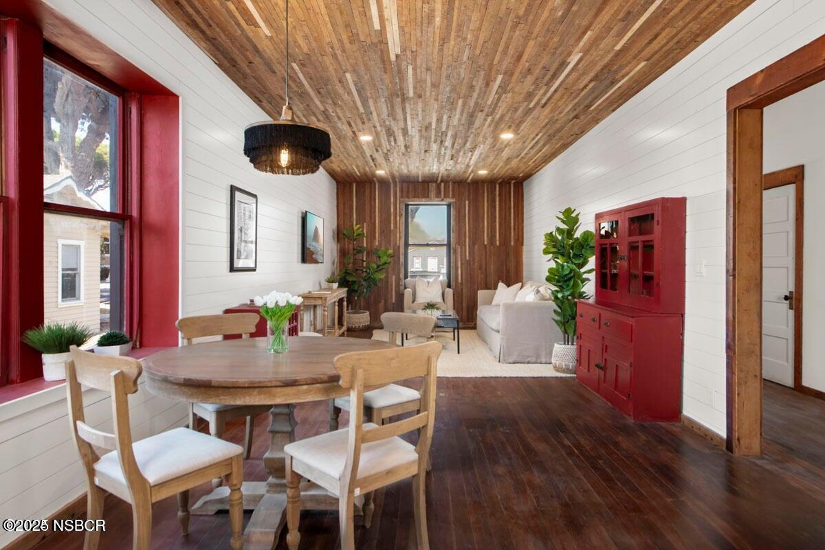 215 South H Street Lompoc, CA 93436 - Photo 4 of 24 a view of a dining room with furniture and wooden floor