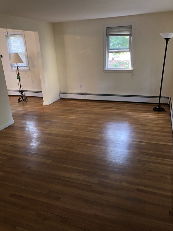 27 George Road, Unit 27 Winchester, MA 01890 - Photo 18 of 30 a view of a room with wooden floor