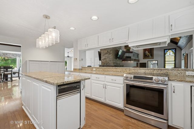 a bathroom with a sink toilet and a mirror