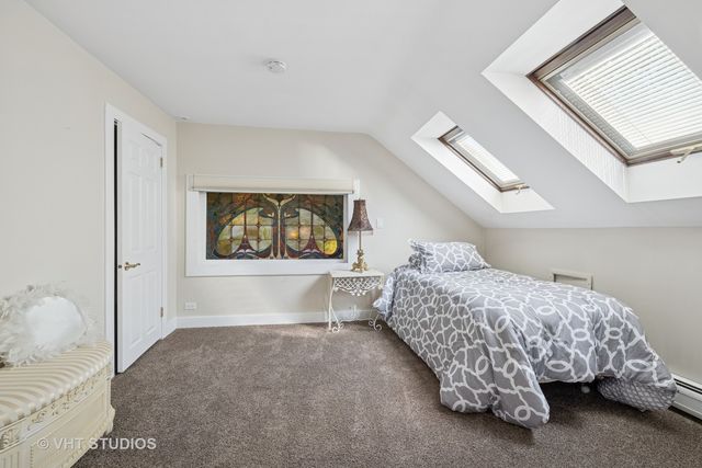 a view of parking garage with cars