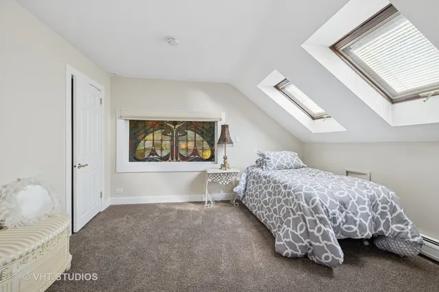 a view of parking garage with cars