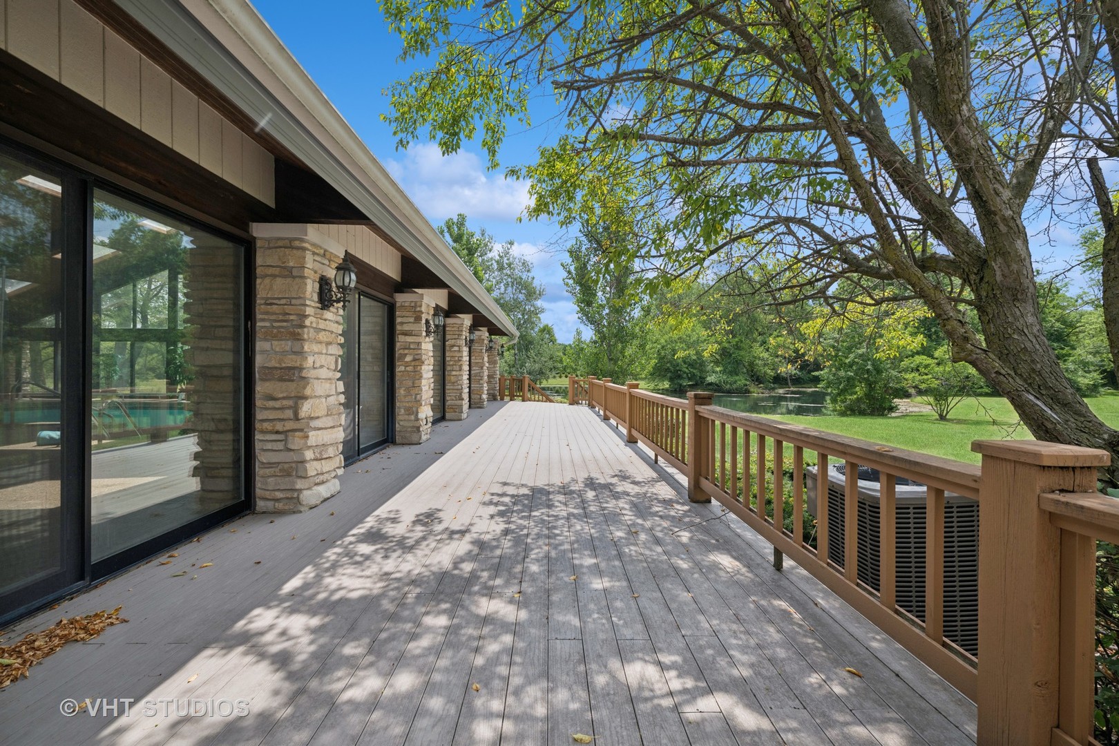 153 Algonquin Road Barrington Hills, IL 60010 - Photo 50 of 95 a view of balcony with wooden floor and fence