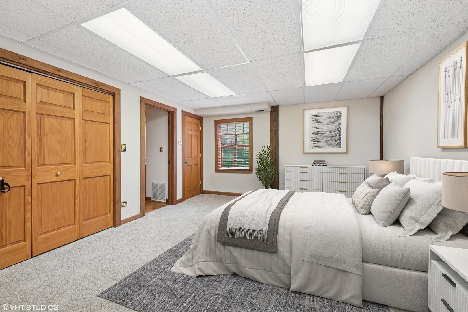 153 Algonquin Road Barrington Hills, IL 60010 - Photo 67 of 95 a bedroom with a large bed and wooden floor