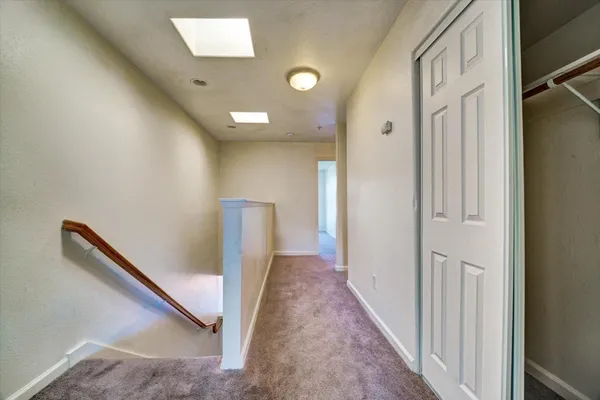 a view of a hallway with entryway