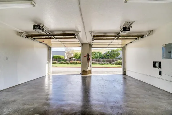 a view of a big house with a street view
