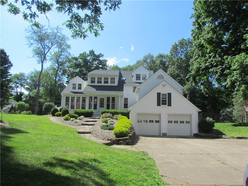 a house view with a garden space
