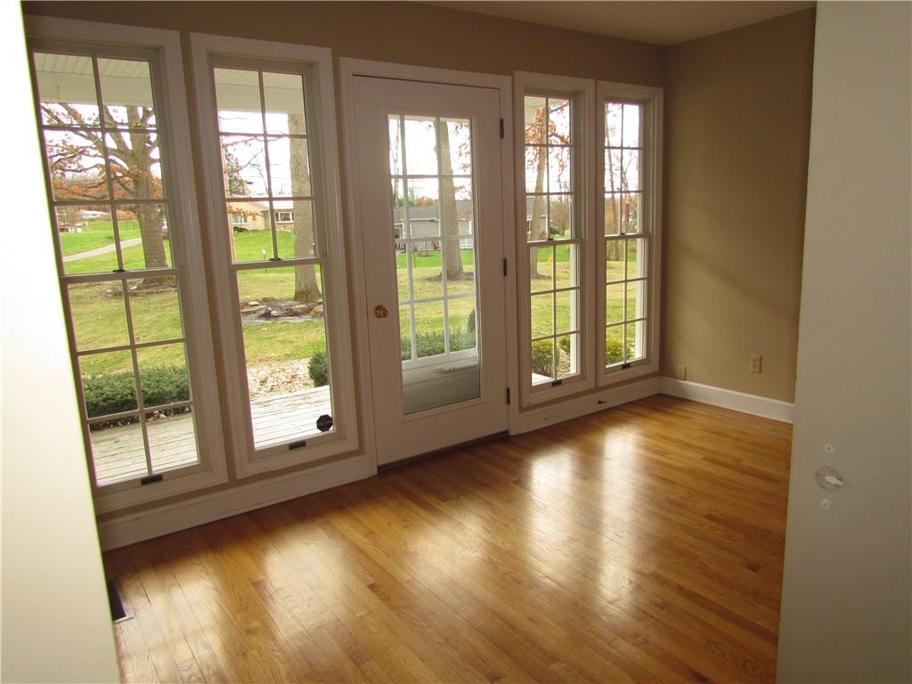 2996 Mercer West Middlesex Road West Middlesex, PA 16159 - Photo 16 of 48 a view of an empty room with wooden floor and a window