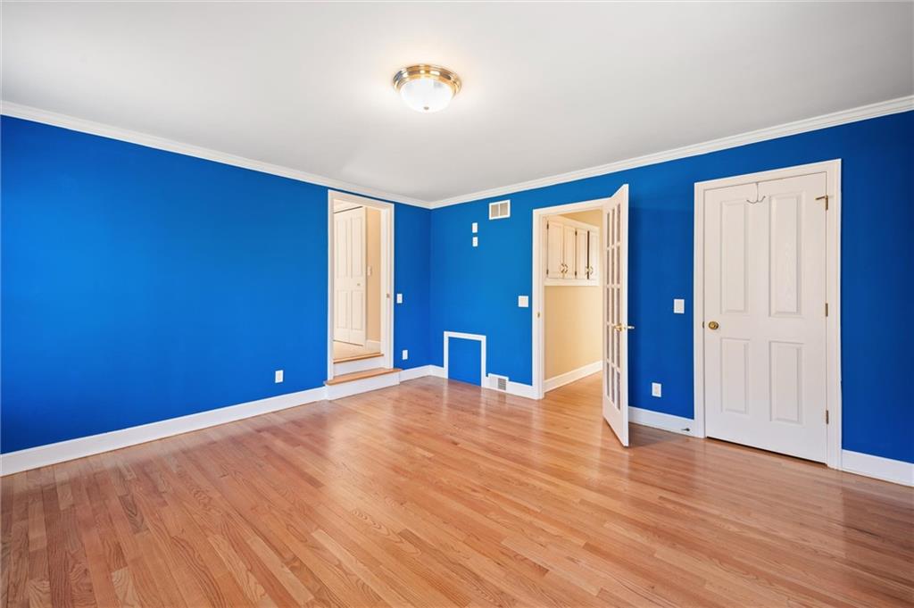 2996 Mercer West Middlesex Road West Middlesex, PA 16159 - Photo 30 of 48 a view of an empty room with wooden floor and closet