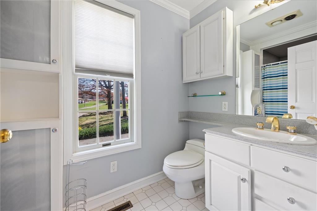 2996 Mercer West Middlesex Road West Middlesex, PA 16159 - Photo 33 of 48 a bathroom with a sink a toilet and a window