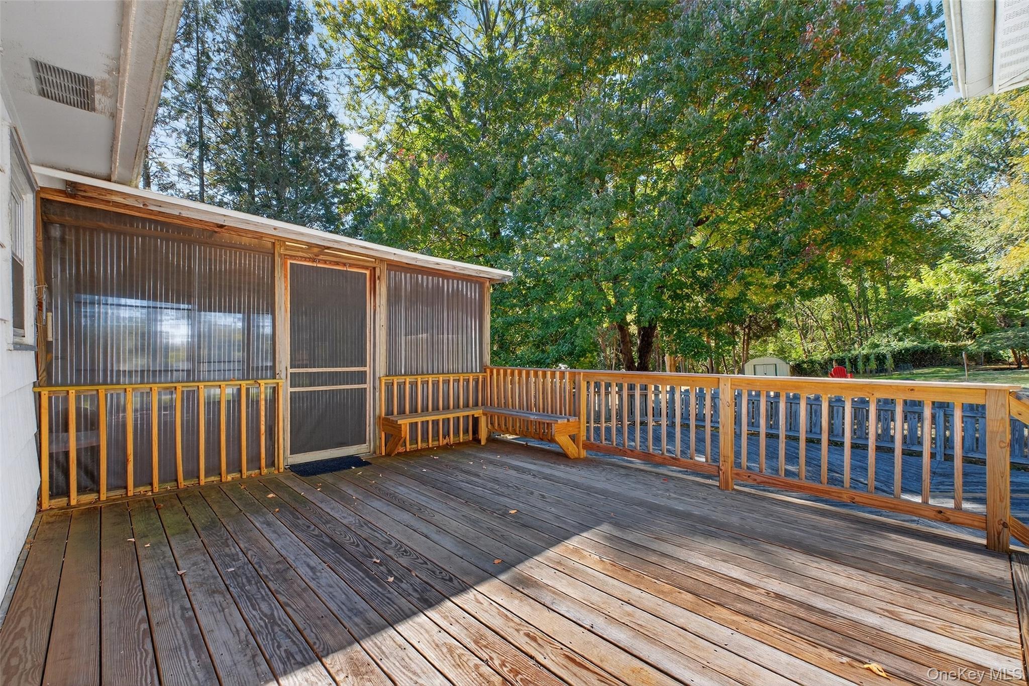 97 Friendly Road Mahopac, NY 10541 - Photo 46 of 49 Deck with a sunroom,