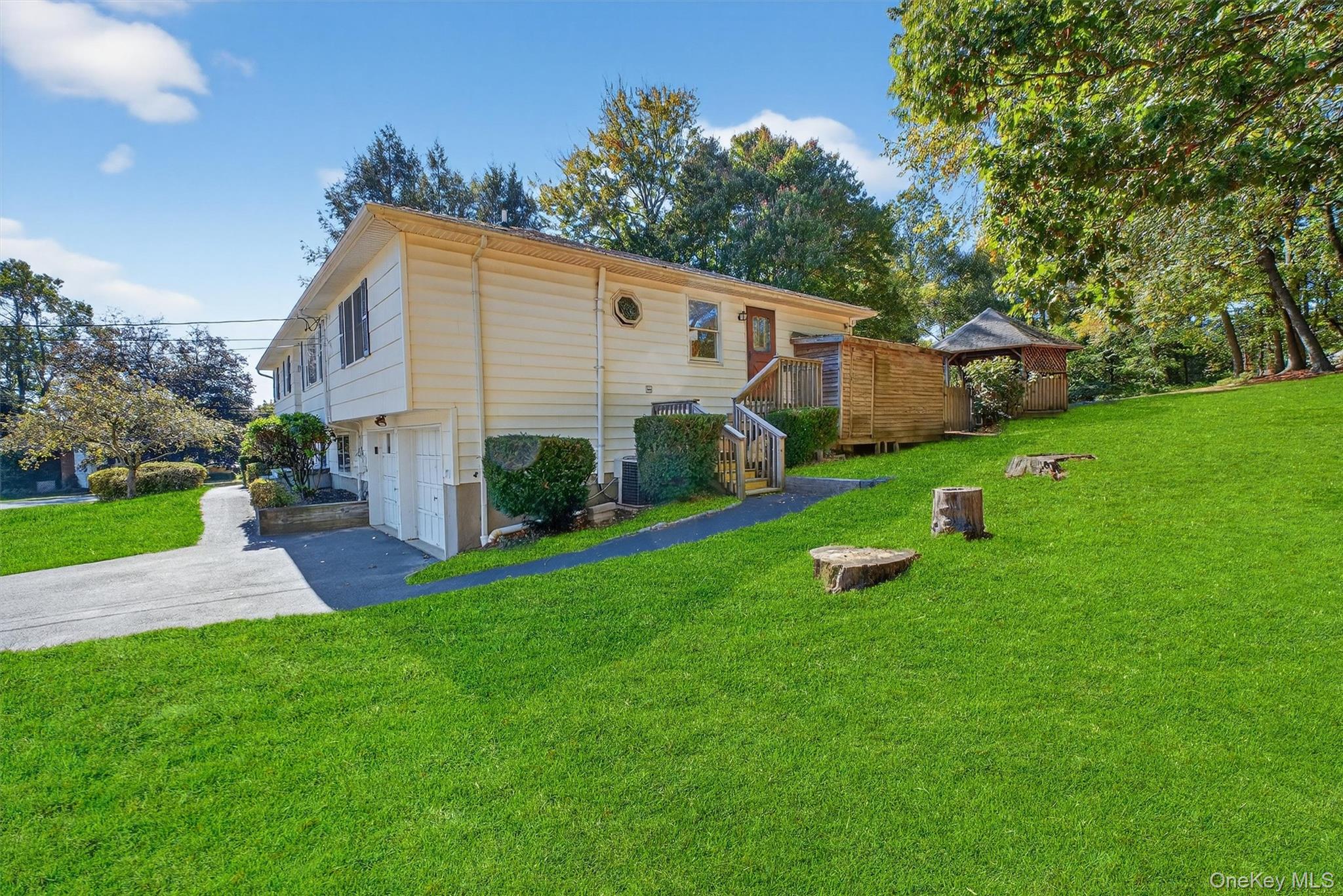 97 Friendly Road Mahopac, NY 10541 - Photo 48 of 49 Right side with entrance to accessory apartment