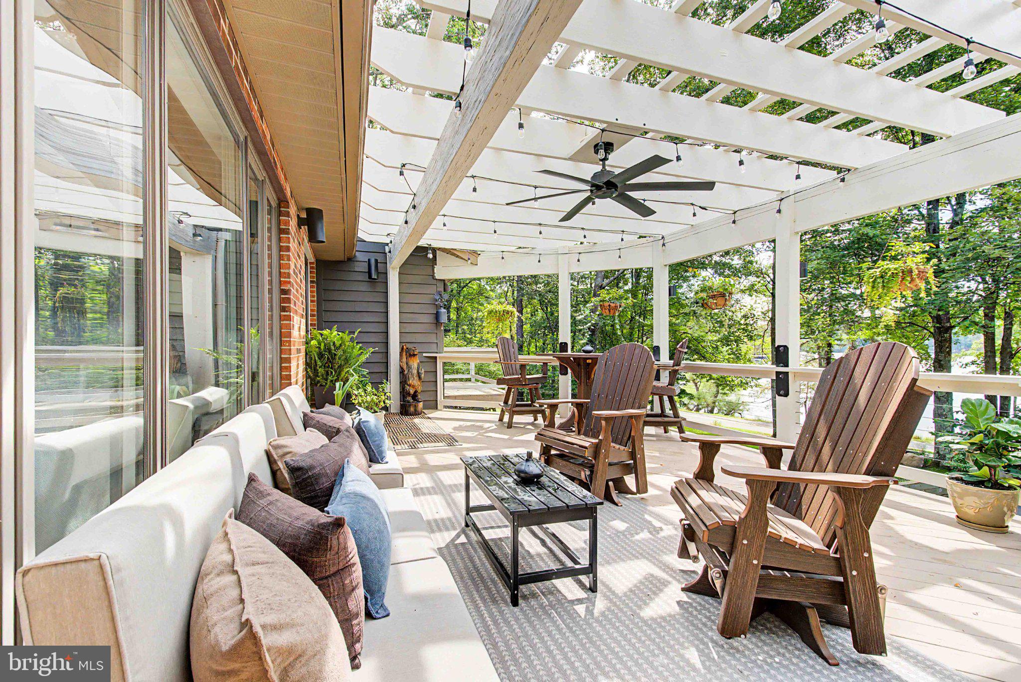 1001 Penn Point Road Oakland, MD 21550 - Photo 4 of 61 Serene outdoor retreat with shaded patio.