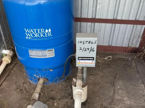 a view of a room with a rug and a window