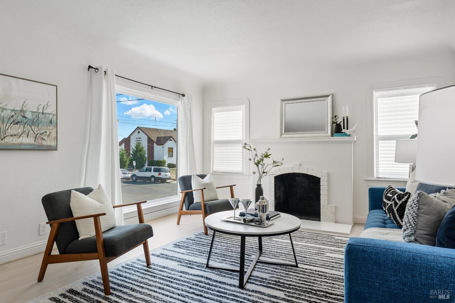 1402 Rice Street Vallejo, CA 94590 - Photo 11 of 55 a living room with furniture and a fireplace