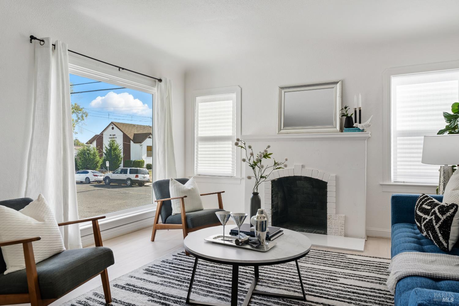 1402 Rice Street Vallejo, CA 94590 - Photo 12 of 55 a living room with furniture and a fireplace