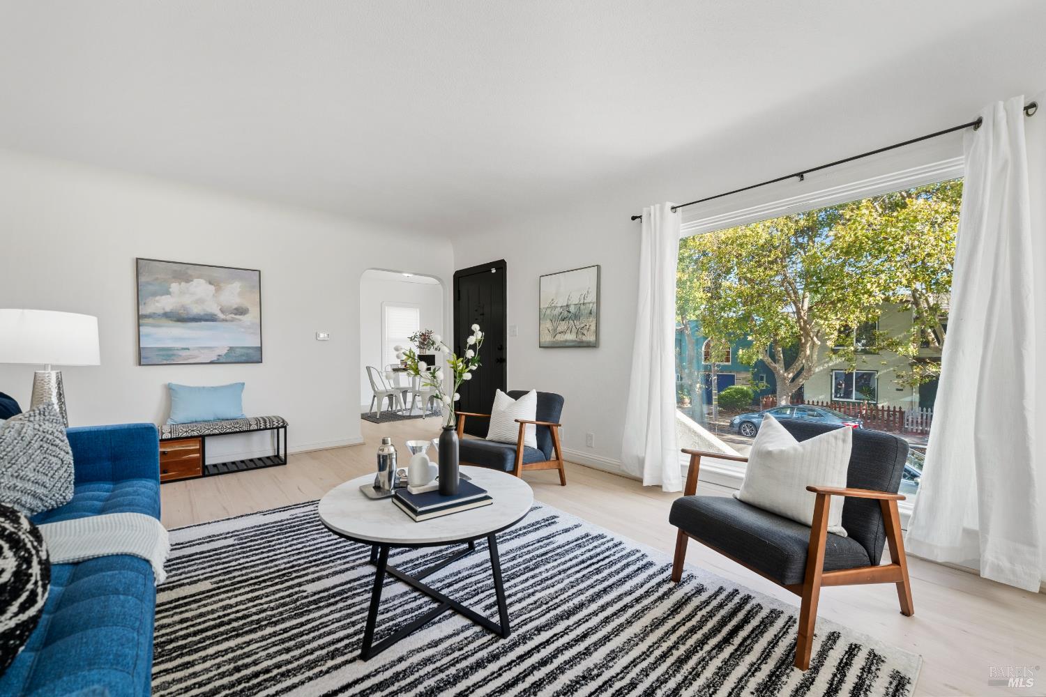 1402 Rice Street Vallejo, CA 94590 - Photo 14 of 55 a living room with furniture and a large window
