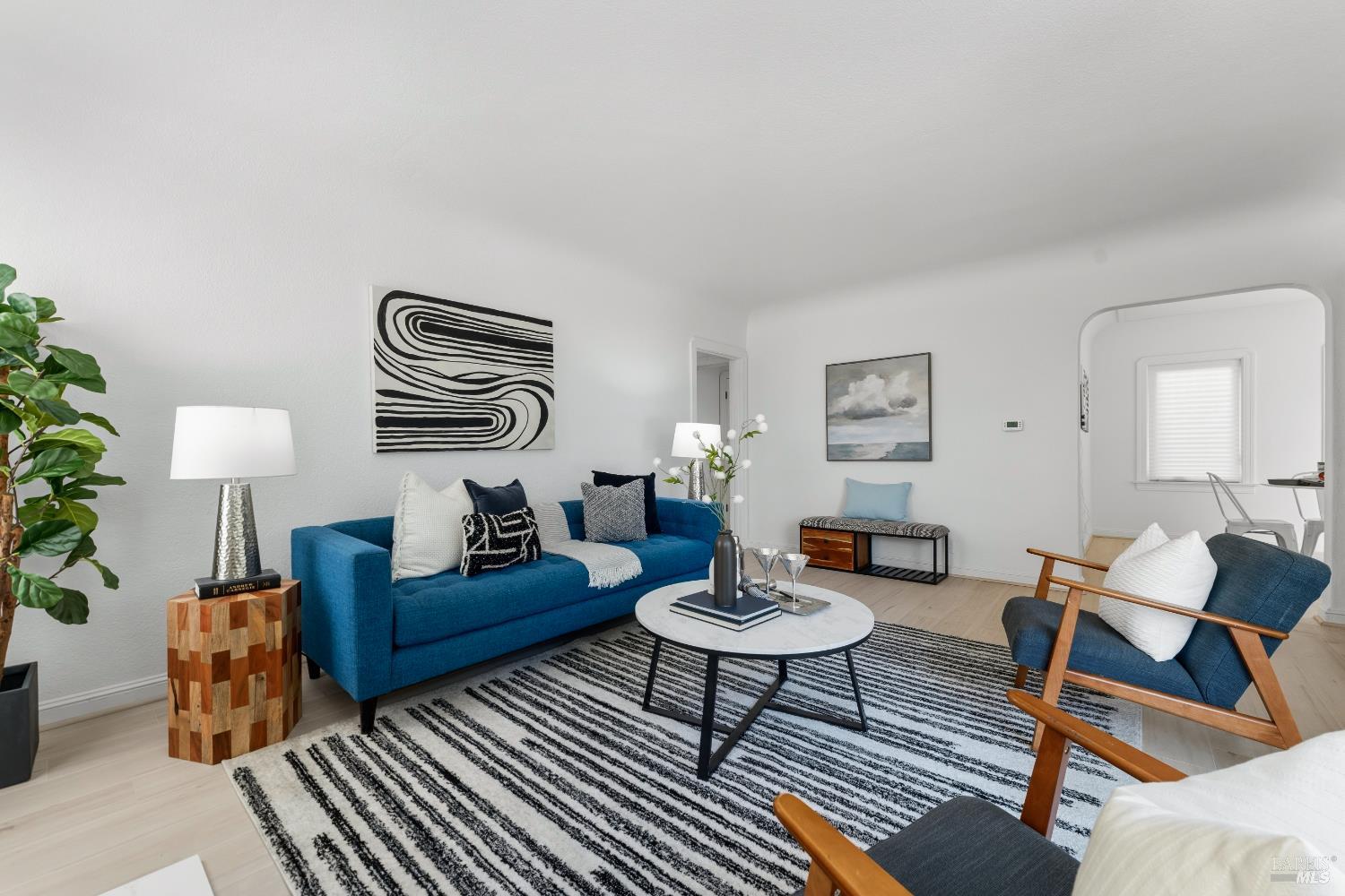 1402 Rice Street Vallejo, CA 94590 - Photo 15 of 55 a living room with furniture and wooden floor