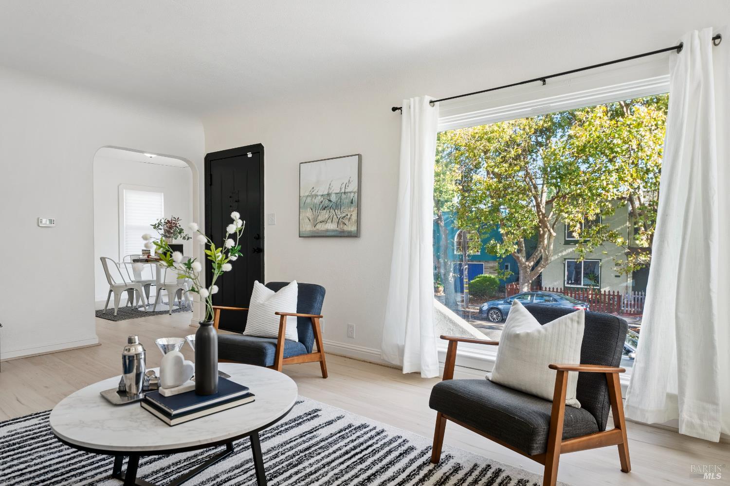 1402 Rice Street Vallejo, CA 94590 - Photo 16 of 55 a living room with furniture and a window