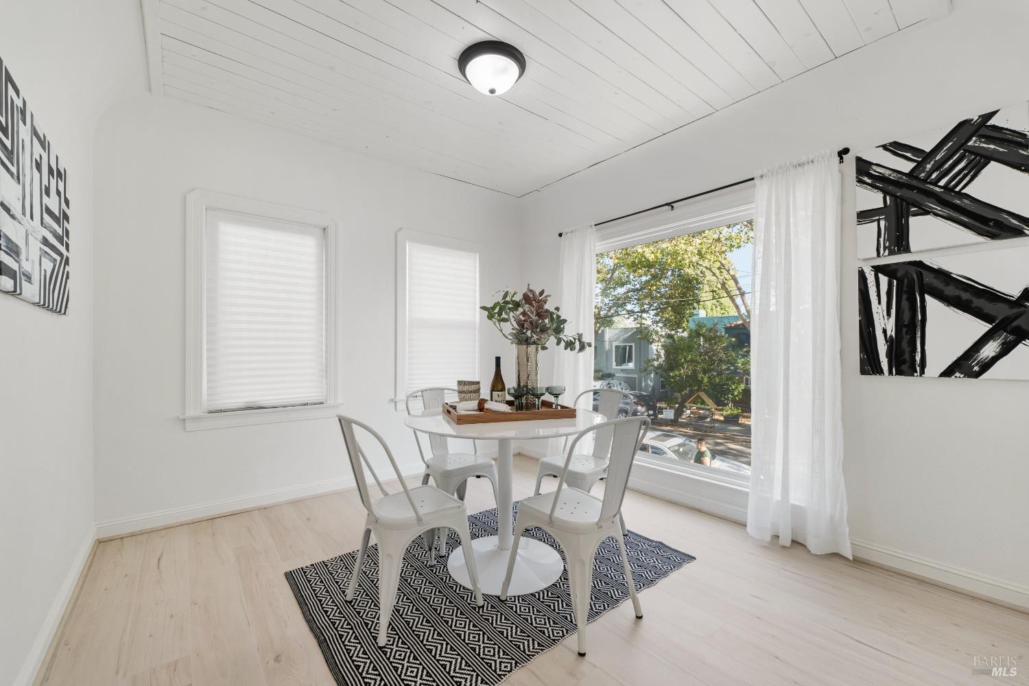 1402 Rice Street Vallejo, CA 94590 - Photo 19 of 55 a dining room with furniture and window