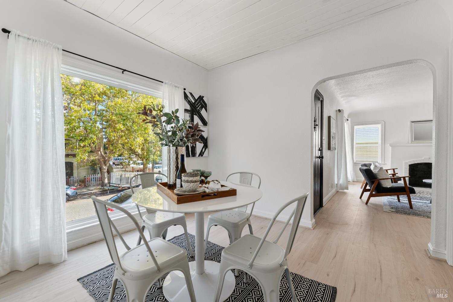 1402 Rice Street Vallejo, CA 94590 - Photo 20 of 55 a dining room with furniture window and wooden floor