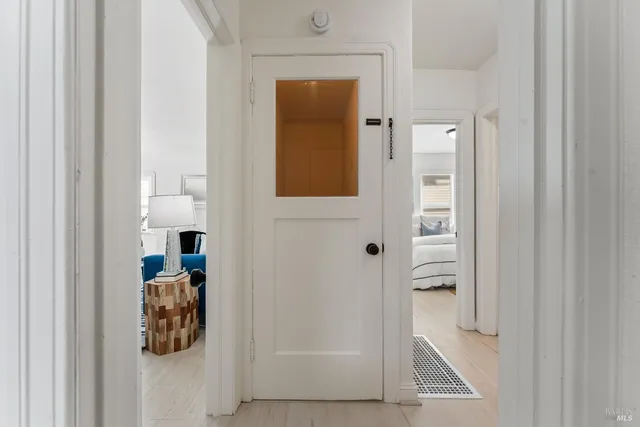 an empty room with a fireplace