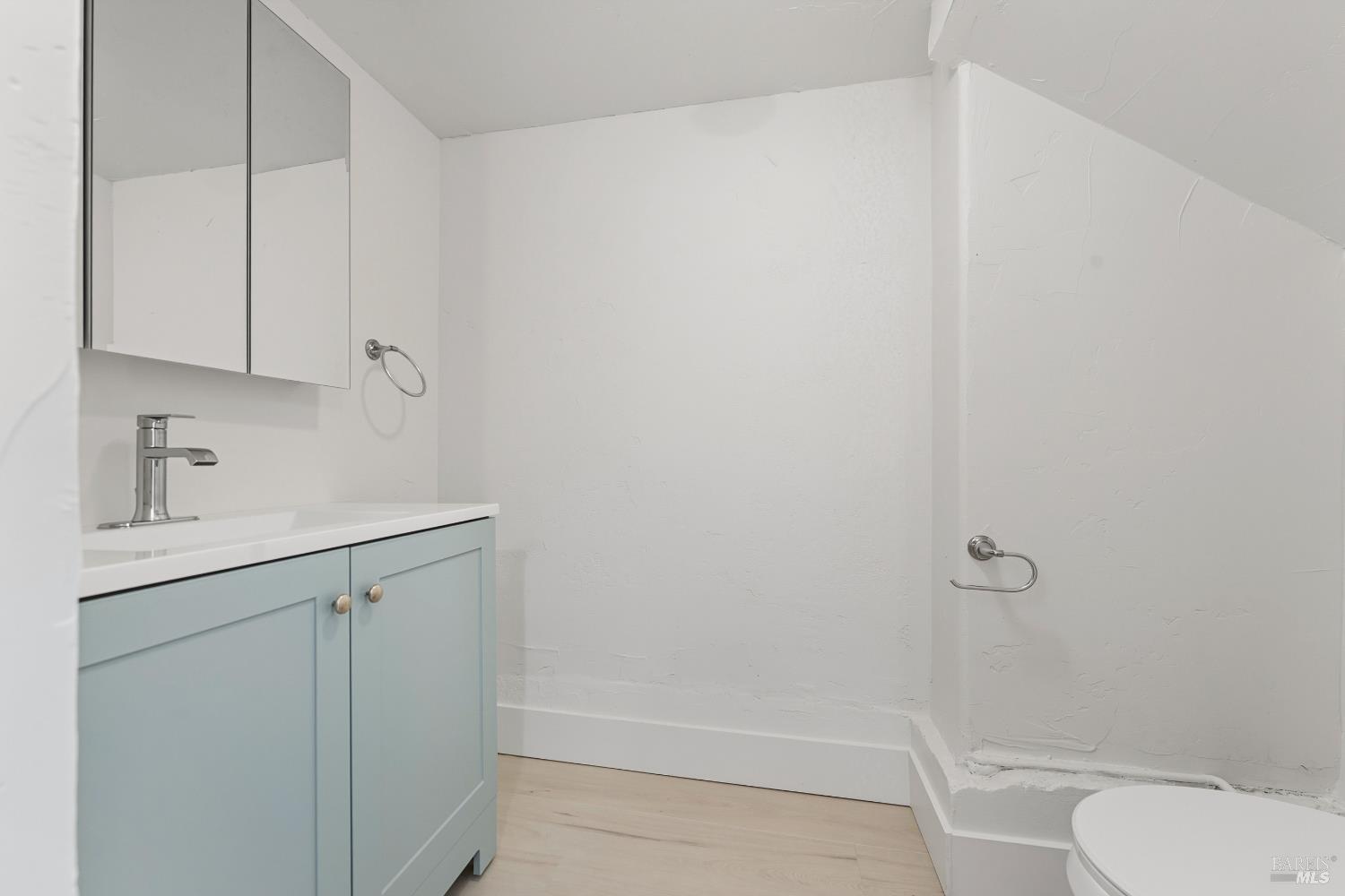 1402 Rice Street Vallejo, CA 94590 - Photo 39 of 55 a bathroom with a sink a toilet and shower