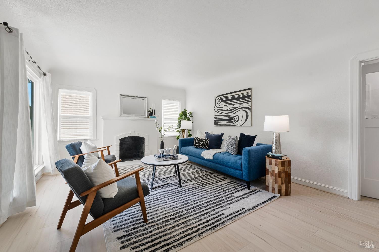 1402 Rice Street Vallejo, CA 94590 - Photo 50 of 55 a living room with furniture and a fireplace