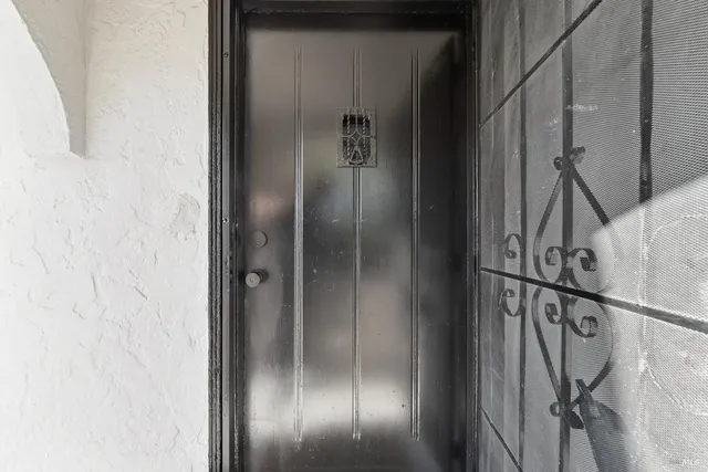 a view of elevator with wooden door