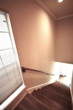 a view of balcony with wooden floor