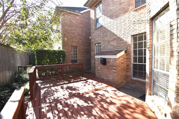 a balcony view with a outdoor seating