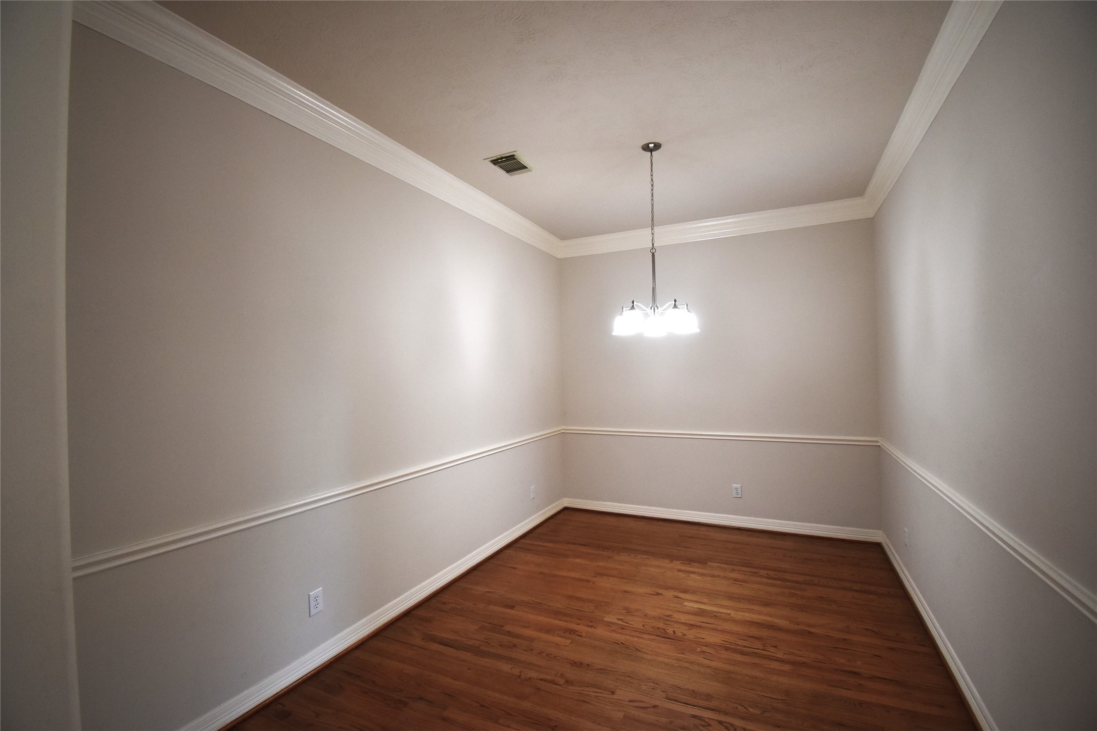 2835 Briarhurst Park Houston, TX 77057 - Photo 5 of 28 a view of a room with wooden floor and windows