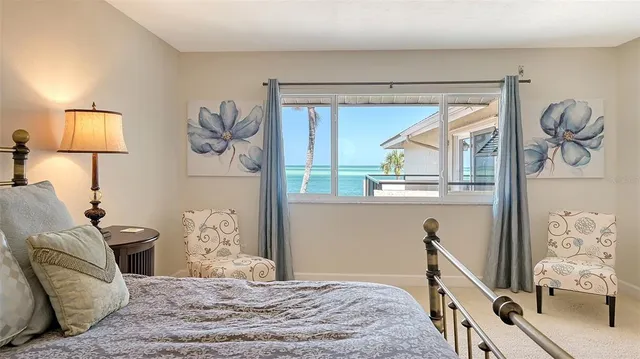 a bed room with a bed and window