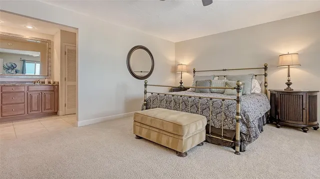 a view of a livingroom with furniture and mirror