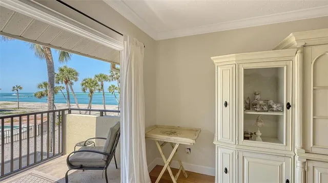 a view of a balcony and chair