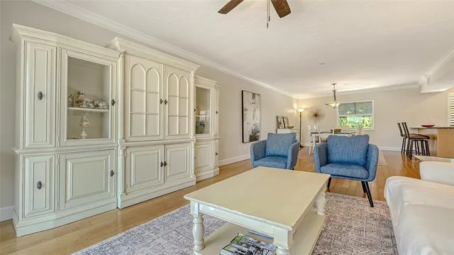 a view of a livingroom with furniture and a rug