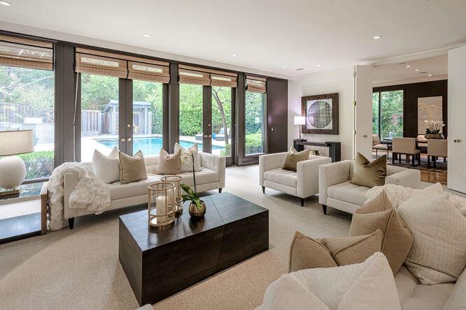 747 Bromfield Road Hillsborough, CA 94010 - Photo 12 of 76 a living room with furniture and large windows