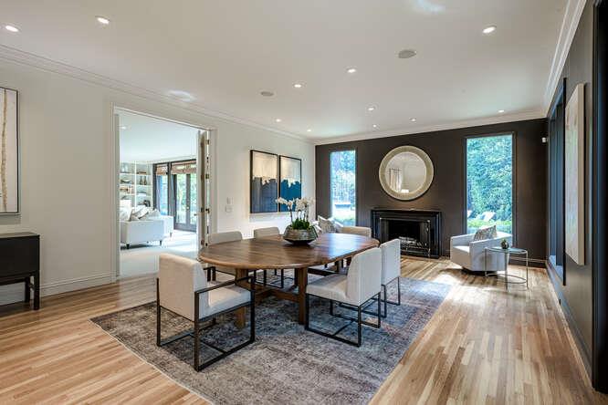 747 Bromfield Road Hillsborough, CA 94010 - Photo 14 of 76 a view of a dining room with furniture and a large window