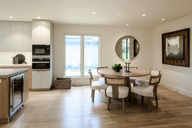 747 Bromfield Road Hillsborough, CA 94010 - Photo 23 of 76 a view of a dining room with furniture window and wooden floor
