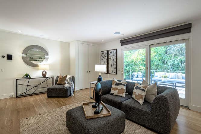 747 Bromfield Road Hillsborough, CA 94010 - Photo 25 of 76 a living room with furniture and a large window
