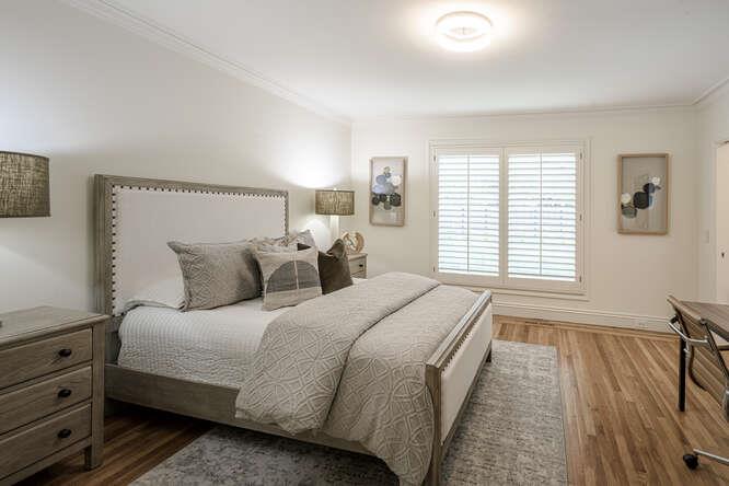 747 Bromfield Road Hillsborough, CA 94010 - Photo 42 of 76 a bedroom with bed and a window