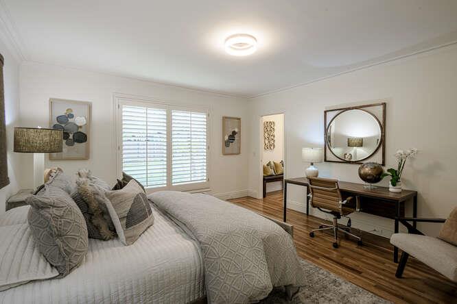 747 Bromfield Road Hillsborough, CA 94010 - Photo 43 of 76 a bedroom with bed and a window