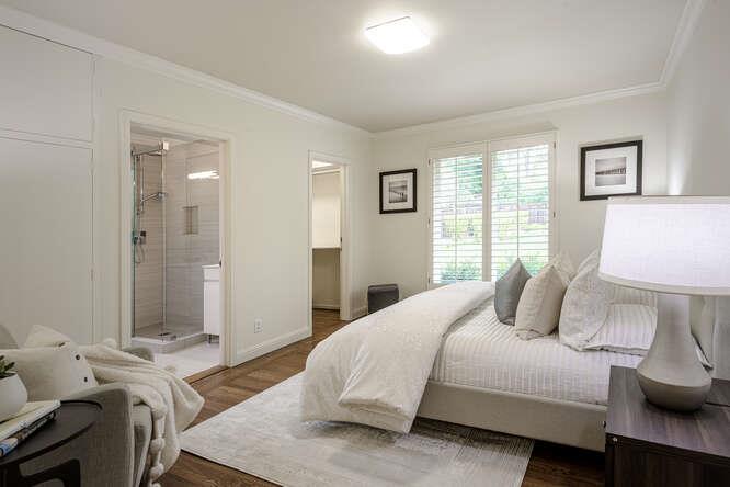 747 Bromfield Road Hillsborough, CA 94010 - Photo 46 of 76 a bedroom with a bed and a window