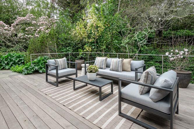 747 Bromfield Road Hillsborough, CA 94010 - Photo 49 of 76 a roof deck with couches and wooden floor
