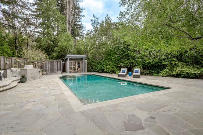 747 Bromfield Road Hillsborough, CA 94010 - Photo 53 of 76 a view of a house with backyard and trees