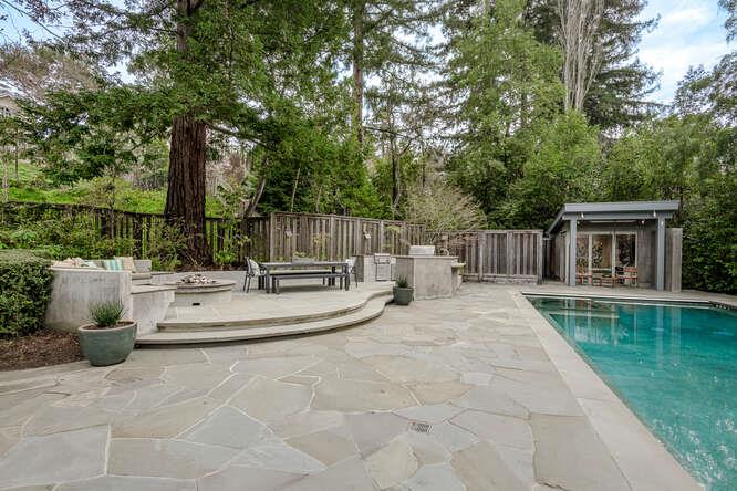 747 Bromfield Road Hillsborough, CA 94010 - Photo 54 of 76 a view of a house with backyard and sitting area
