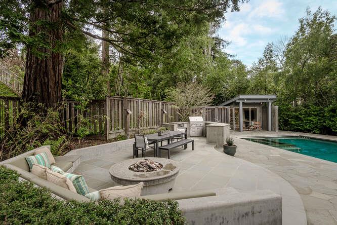 747 Bromfield Road Hillsborough, CA 94010 - Photo 56 of 76 a view of a patio with couches table and chairs and garden