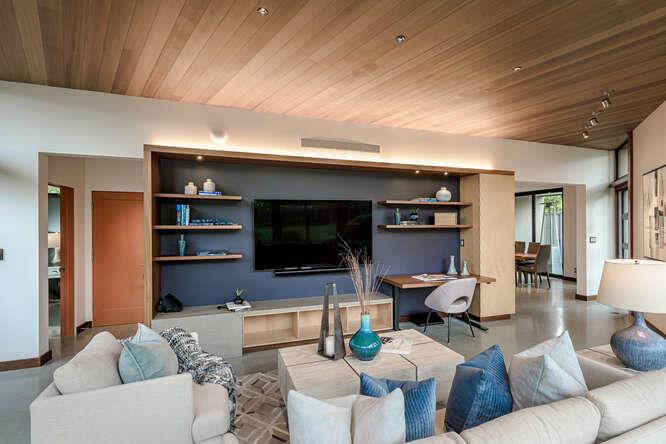 747 Bromfield Road Hillsborough, CA 94010 - Photo 61 of 76 a living room with furniture and a flat screen tv