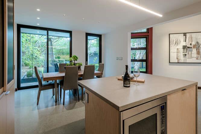 747 Bromfield Road Hillsborough, CA 94010 - Photo 66 of 76 a view of a dining room with furniture and window
